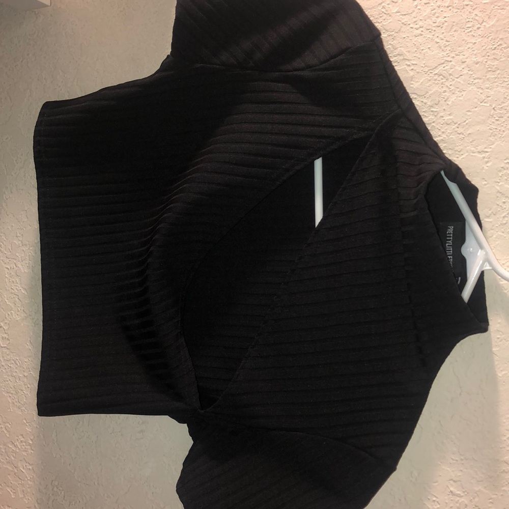 Black cropped top with slit on the chest